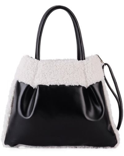 Most Wanted Usa Reversible Faux Shearling Pu Tote Bag In Black At Nordstrom Rack