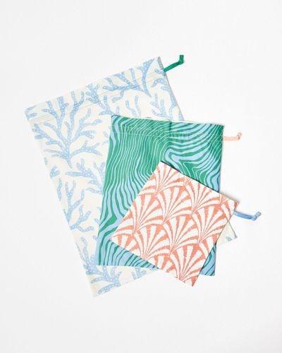 Oliver Bonas Coral Printed Fabric Travel Bags Set Of Three - Blue
