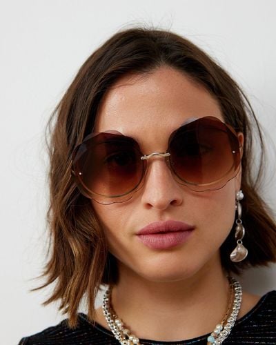 Oliver Bonas Wavy Rimless Metal Round Sunglasses - Brown