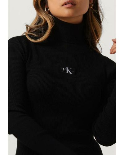 Calvin Klein Minikleid Badge Roll Neck Sweater Dress - Schwarz