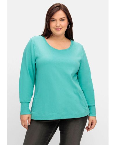 Sheego Sweatshirt Große Größen mit Taschen und tiefem Rundhalsausschnitt - Grün