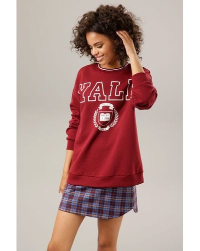 Aniston CASUAL Sweatshirt mit "YALE"-Schriftzug und Druck im Vorderteil - Rot