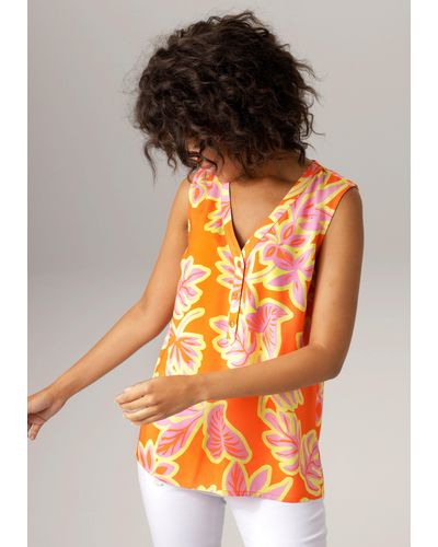 Aniston CASUAL Blusentop mit farbintensivem, großflächigem Blätter-Druck - Orange