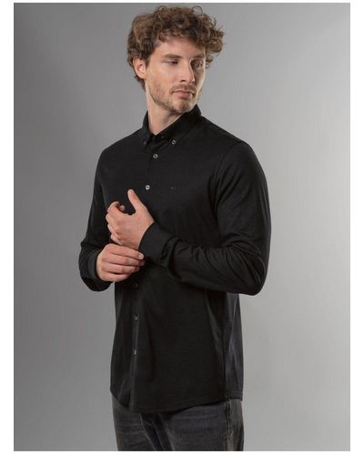 Trigema Poloshirt Business-Hemd aus DELUXE-Single-Jersey (1-tlg) - Schwarz