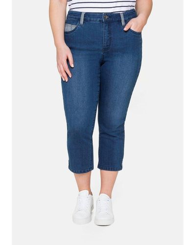 Sheego Capri-Jeans Bis Online-Schlussverkauf cropped Lyst | – 76% Damen für zu und | DE Jeans Rabatt