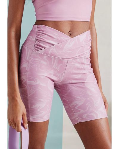 LASCANA ACTIVE Funktionshose -Sporthose mit Allover-Print und kleiner Reißverschlusstasche - Pink