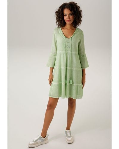 Aniston CASUAL Tunikakleid ( Jersey-Unterkleid) mit aufwändiger Spitzenverzierung - Grün