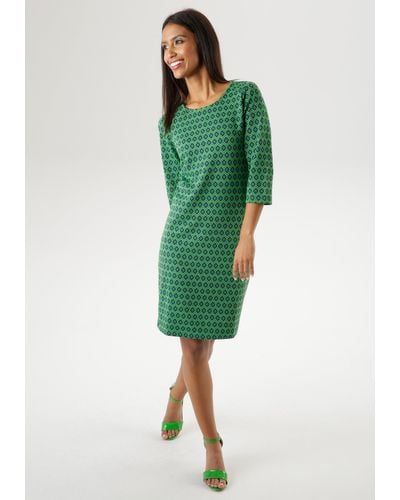 Aniston SELECTED Jerseykleid mit trendy Retromuster - Grün
