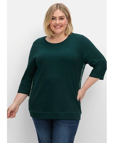 Sheego Sweatshirt Große Größen aus Waffelpiqué, mit Zierband seitlich - Grün
