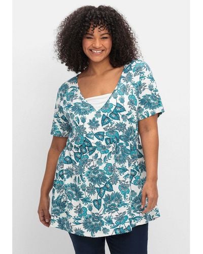 Sheego T-Shirt Große Größen in Layeroptik, mit elastischer Taillennaht - Blau