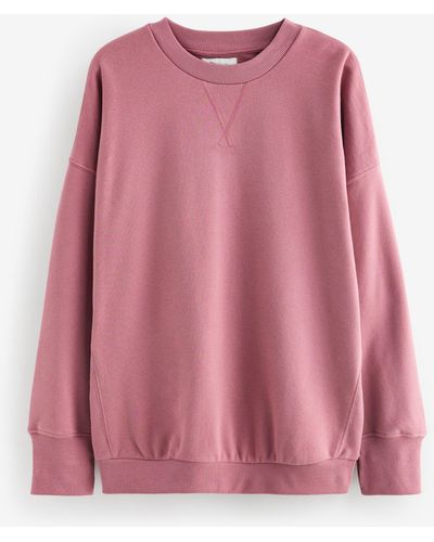Next Longsweatshirt Oversized Fit längeres Active Rundhals-Sweatshirt (1-tlg) - Pink