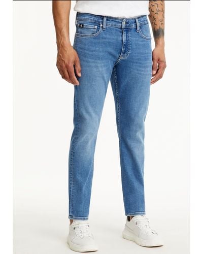 Calvin Klein Fit-Jeans SLIM mit Calvin Klein Leder-Badge - Blau