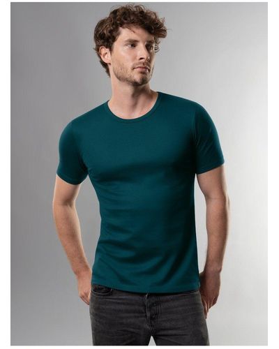 Trigema T-Shirt aus Baumwolle/Elastan (1-tlg) - Grün