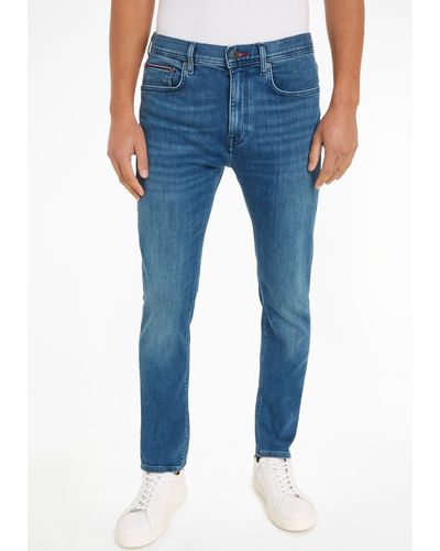 Tommy Hilfiger 5-Pocket-Jeans SLIM BLEECKER PSTR mit Leder-Batch am hinteren Bundabschluss - Blau