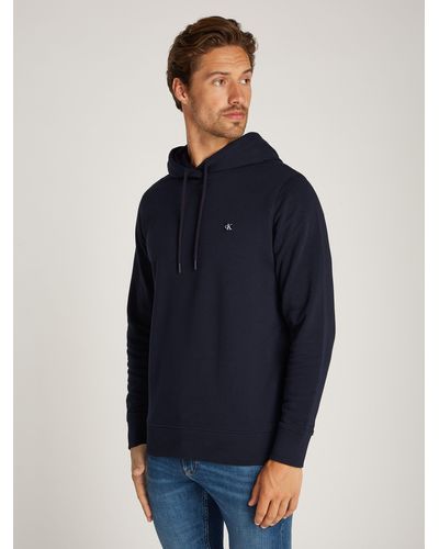 Calvin Klein Sweatshirt CK EMBRO BADGE HOODIE mit Logopatch - Blau