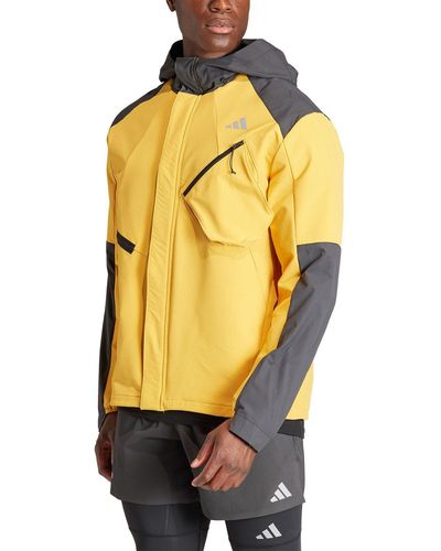 adidas Originals Laufjacke Ultra CTE Jacket mit der isolierenden COLD.RDY Technologie ein warmes Tragegefühl - Gelb
