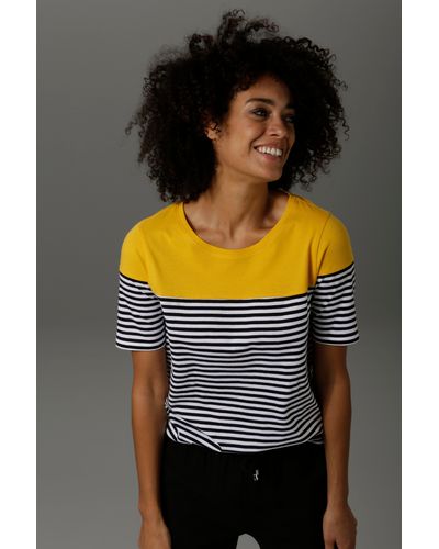 Lyst DE und für Bis Aniston CASUAL zu | Polos | Online-Schlussverkauf T-Shirt Damen – 53% Rabatt