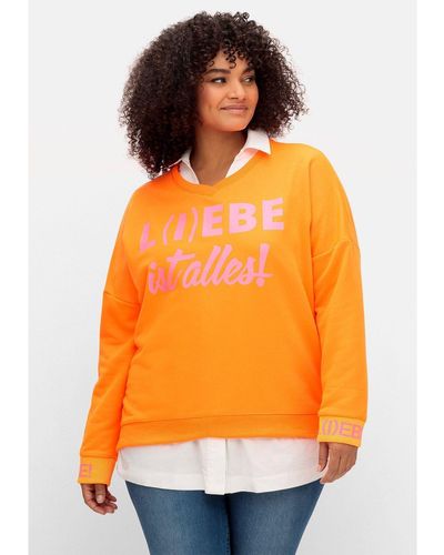 Sheego Sweatshirt Große Größen mit Neon-Print und Seitenschlitzen - Orange