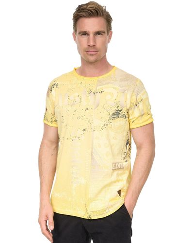 Rusty Neal T-Shirt mit Allover-Print im Used-Look - Gelb