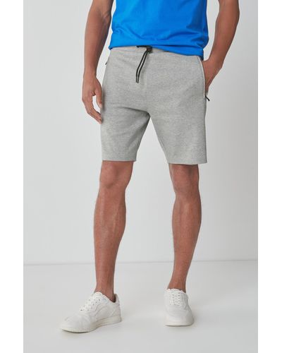 Next Sweatshorts Jersey-Shorts mit Reißverschlusstaschen-Slim Fit (1-tlg) - Grau