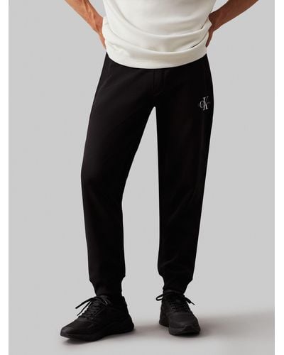 Calvin Klein Jogger Pants MONOLOGO HWK PANT mit Logoschriftzug - Schwarz
