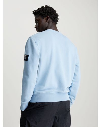 Calvin Klein Sweatshirt WASHED BADGE CREW NECK mit Logopatch - Blau