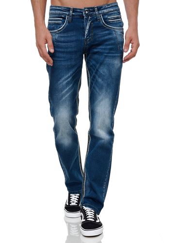 Rusty Neal Straight-Jeans mit trendigen Kontrastnähten - Blau