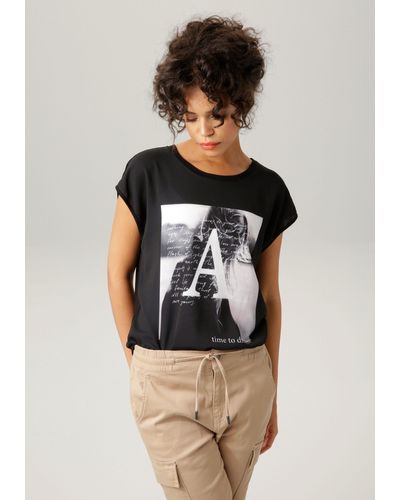 Rabatt – zu für Damen | und CASUAL T-Shirt Bis Polos 53% DE Aniston Online-Schlussverkauf Lyst |