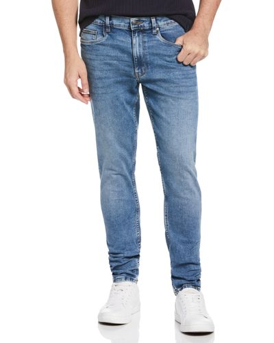 Perry Ellis Recovertm Slim Tapered Fit Light Indigo Denim Jeans - Blue