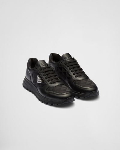 Prada Leather And Re-nylon High-top Sneakers - Black