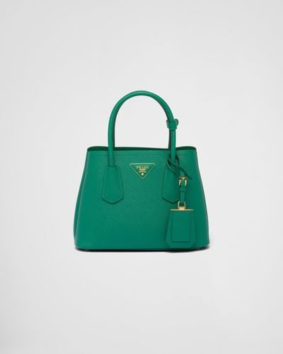 Mini bag attaccata alla borsa deals prada