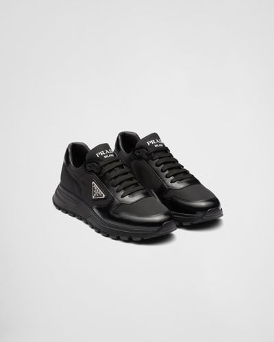 Prada Re-nylon Brand-plaque Leather And Recycled-nylon Low-top Sneakers - Black