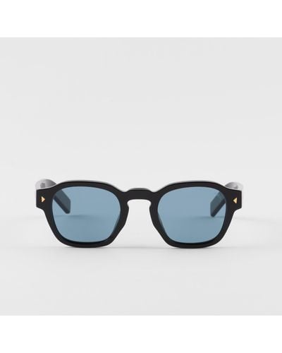 Prada Sunglasses With Iconic Metal Plaque - Blue