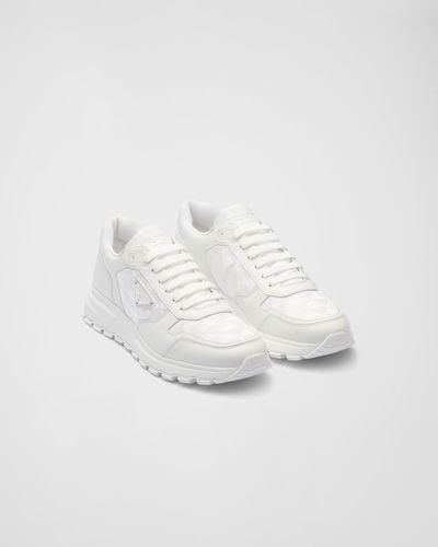 Prada Leather And Re-nylon High-top Sneakers - White