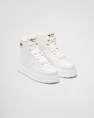Prada Leather And Shearling High-top Sneakers - White