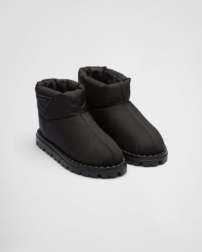 Prada Triangle Padded Boots - Black