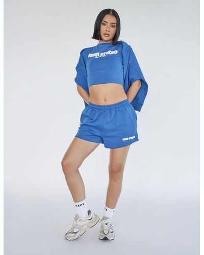 Public Desire Kaiia Studio Bubble Logo Sweat Shorts Blue