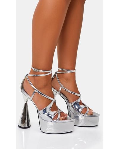 Public Desire Tina Iridescent Silver Mirror Asymmetric Cut Out Strappy Ankle Platform Flared Block Heel - White