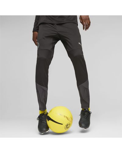PUMA Pantaloni da training calcio Borussia Dortmund per - Nero