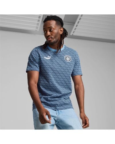 PUMA Manchester City ftblCULTURE T-Shirt mit Allover-Print - Blau