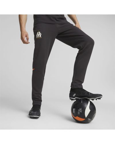PUMA Pantaloni della tuta da calcio Olympique de Marseille Casuals per - Nero