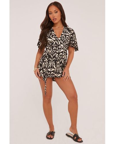 Rebellious Fashion Abstract Print Frill Detail Playsuit - Black