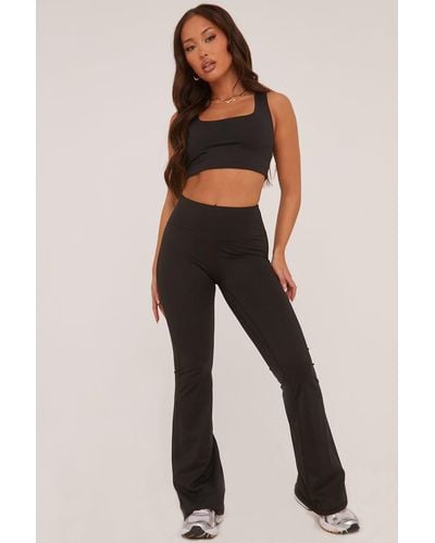 Rebellious Fashion Ruched Back Flared Leg Trousers - Black