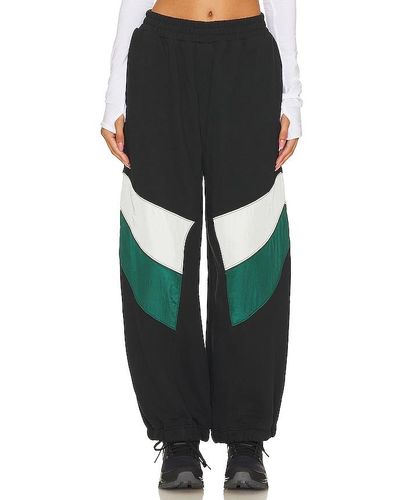 Free People X Fp Movement Hot Track Pant In Black Combo - Green