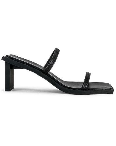 St. Agni Fine Strap Heel In Black. Size 38.