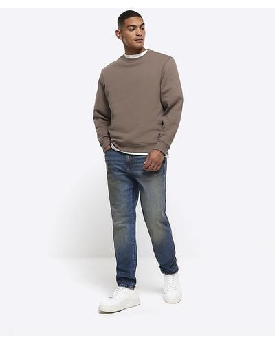 Men's River Island Tapered jeans from $80 | Lyst