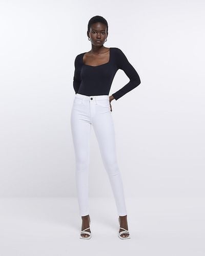 River Island White Molly Mid Rise Skinny Jeans