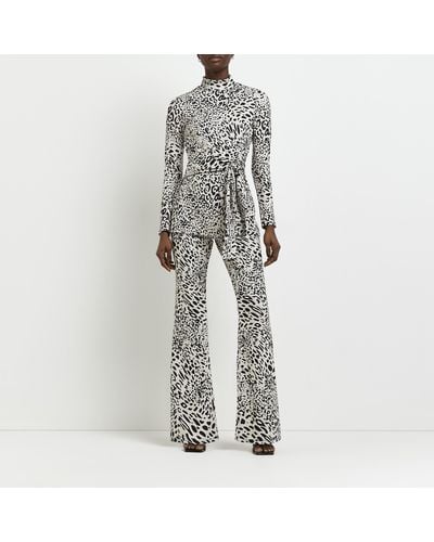 River Island Black Jacquard Leopard Print Flare Trousers - White