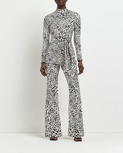 River Island Black Jacquard Leopard Print Flare Pants - White