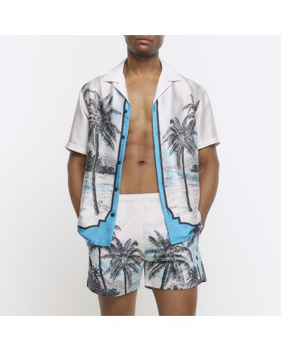 River Island Blue Regular Fit Palm Print Swim Shorts